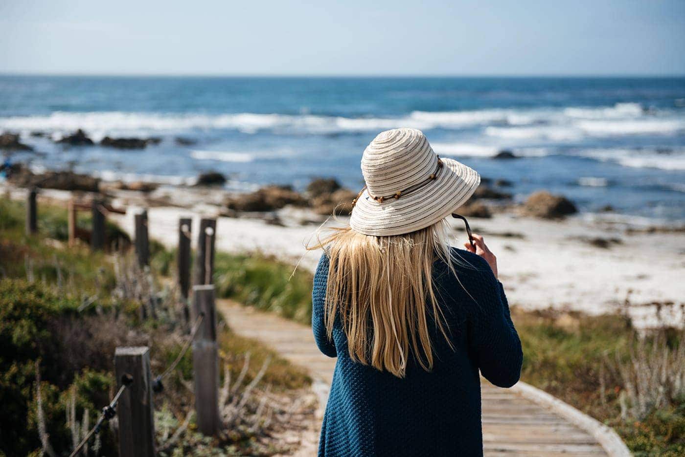 Michaela Moore is extra cautious about skin protection Woman wearing a hat in the sun