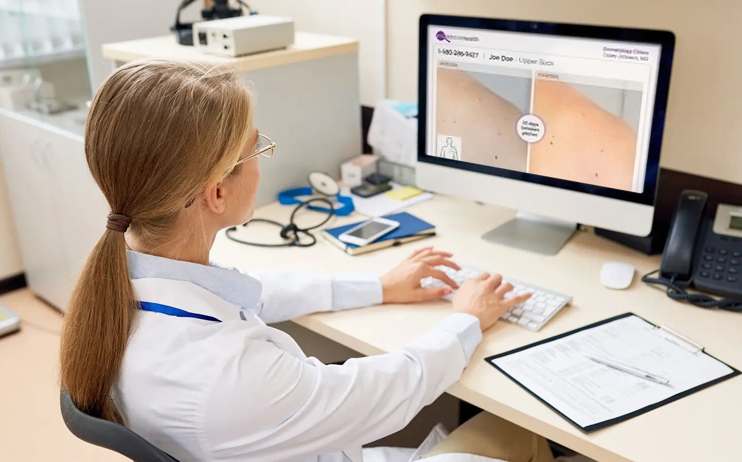 Doctor viewing patient's photos