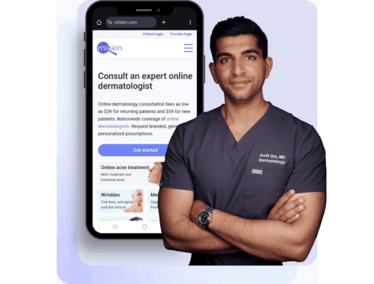 Dr. Amit Om, MD, a board-certified dermatologist, standing with arms crossed in front of a smartphone screen showing the Miiskin website offering online dermatology consultations.