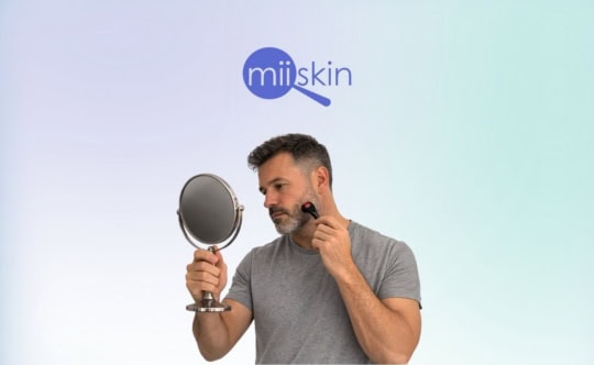 man using derma roller for his beard
