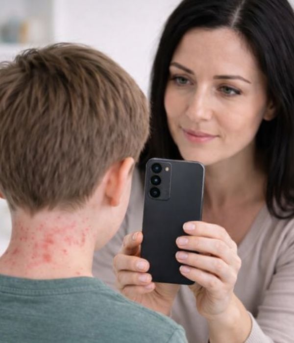 mom and son taking a photos for a scabies photo consultation