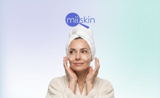woman applying cream in her face for anti-aging