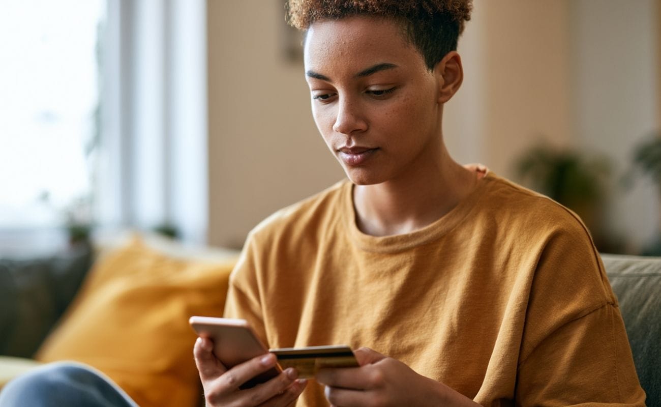 Board-Certified Dermatologists Available for Online Consultation Female dermatologist in a white medical coat standing confidently, representing board-certified dermatology expertise available for telehealth consultations.