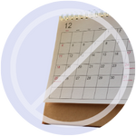 Close-up of a calendar with a diagonal line across it, symbolizing no automatic medication subscriptions.